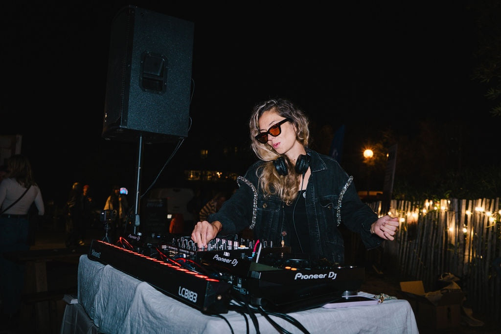 A woman DJing