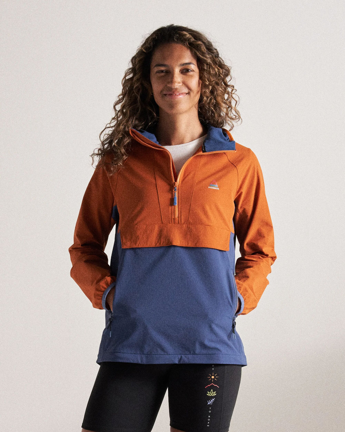 Ocean Light Softshell Anorak - Dark Denim/Sunset Orange - Studio Model