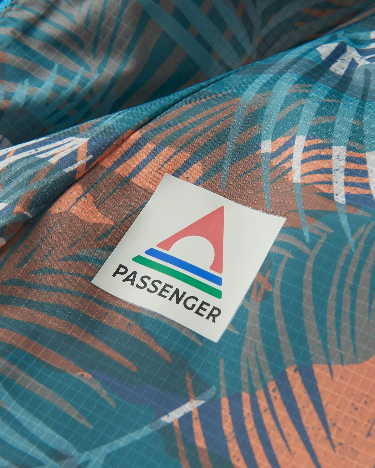 Viento Windshell Anorak - Palm Camo Deep Sea - Flatlay