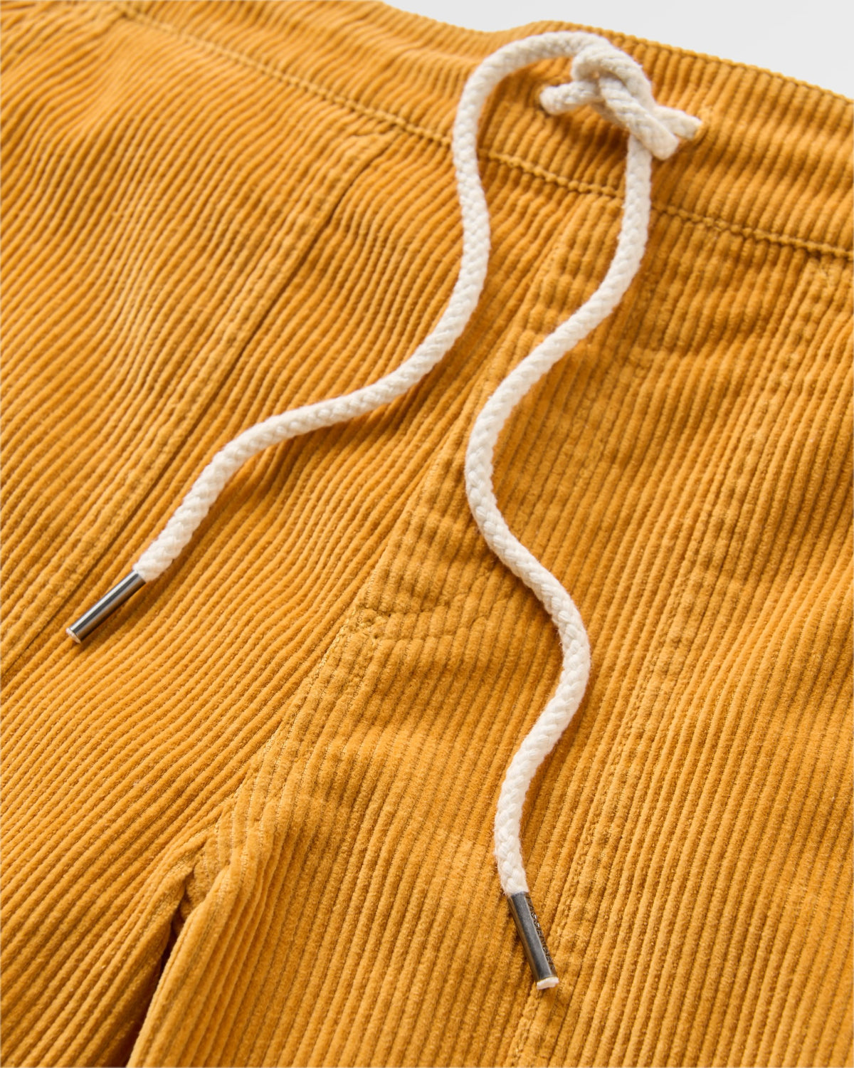 Avian Cord Short - Spruce Yellow - Flatlay