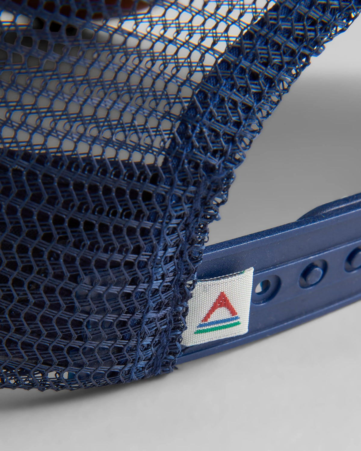 Made To Roam Trucker Cap - Rich Navy/Rubber - Flatlay