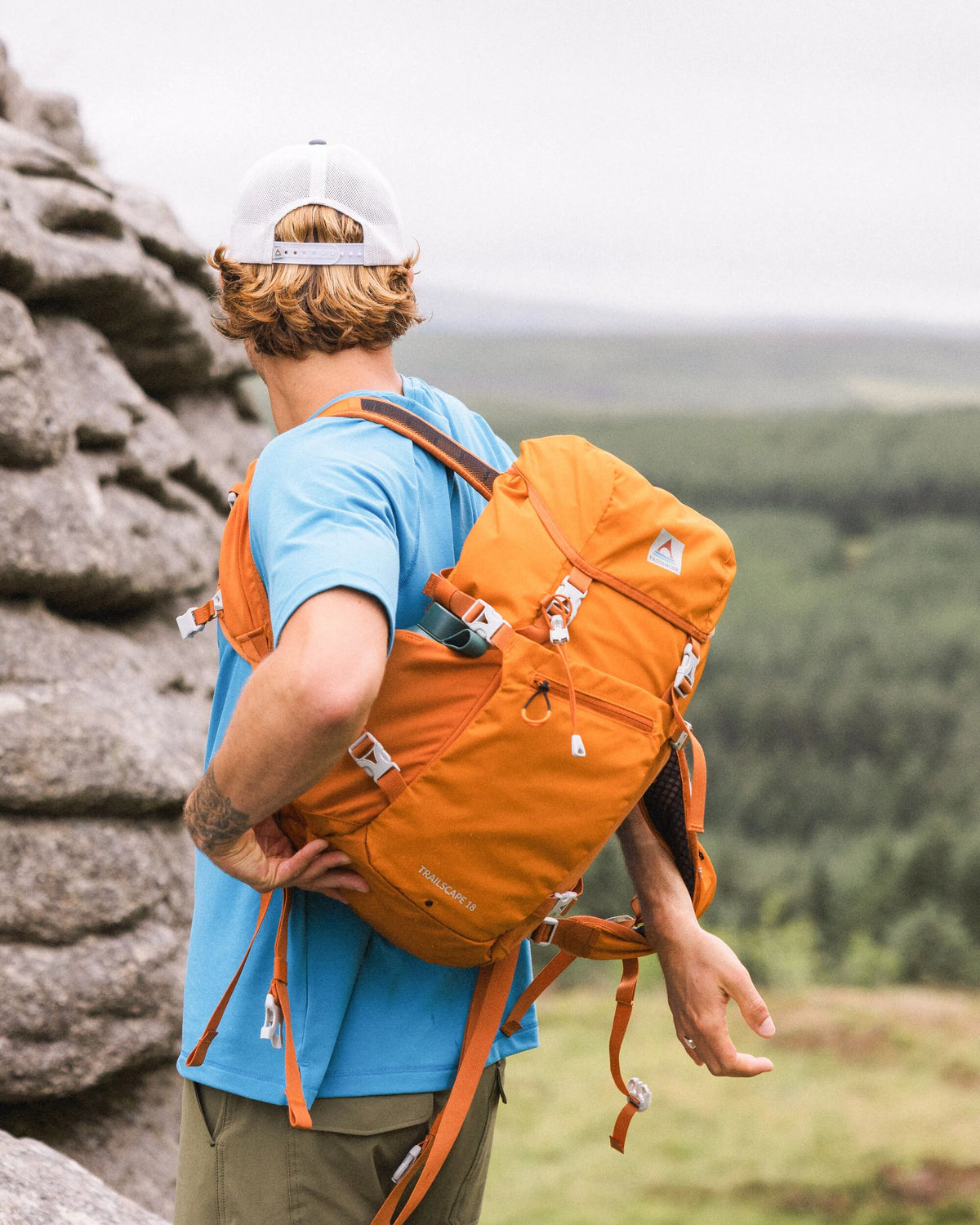 Trailscape 18L Backpack - Sunrise Orange - Lifestyle - Male