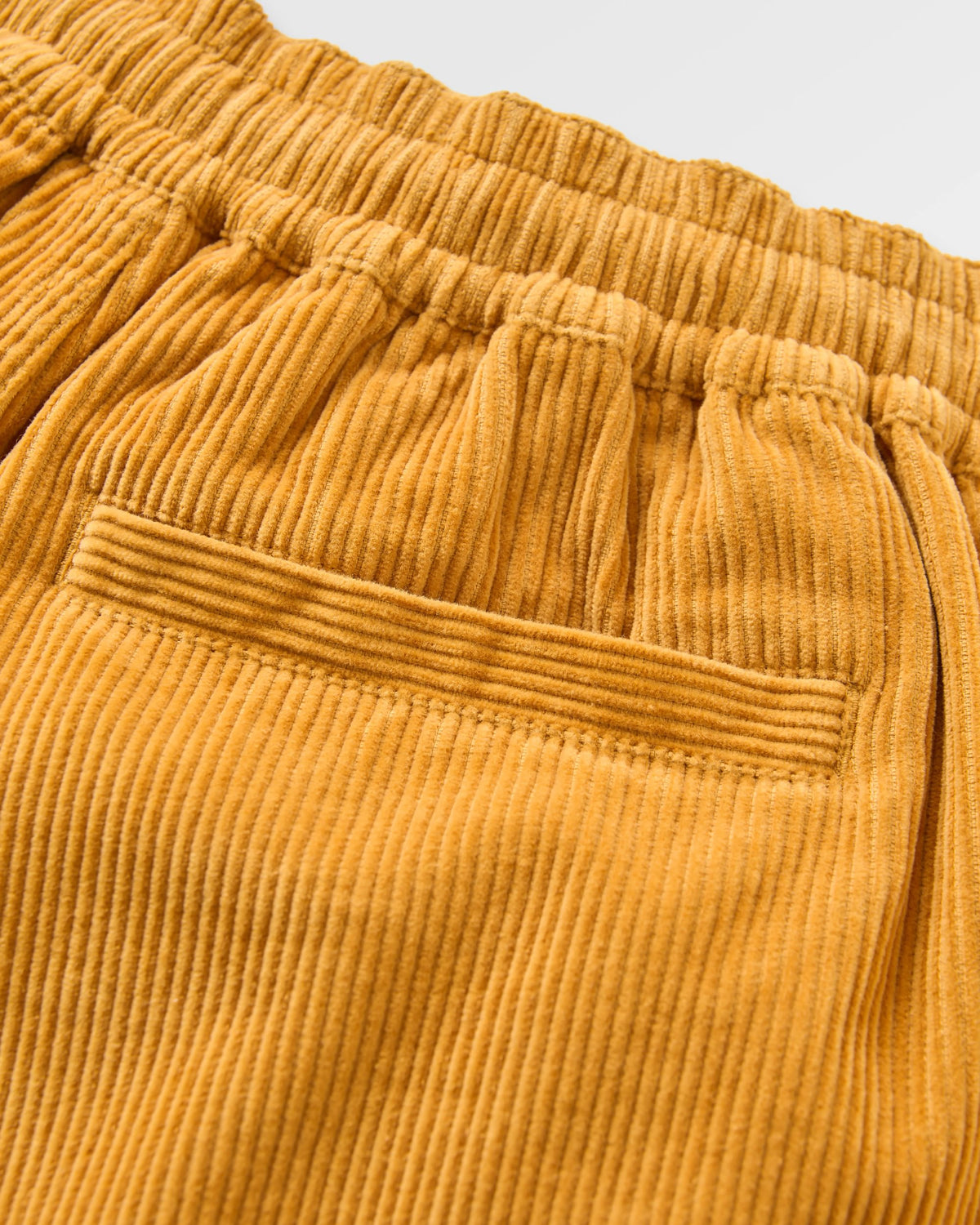 Avian Cord Short - Spruce Yellow - Flatlay