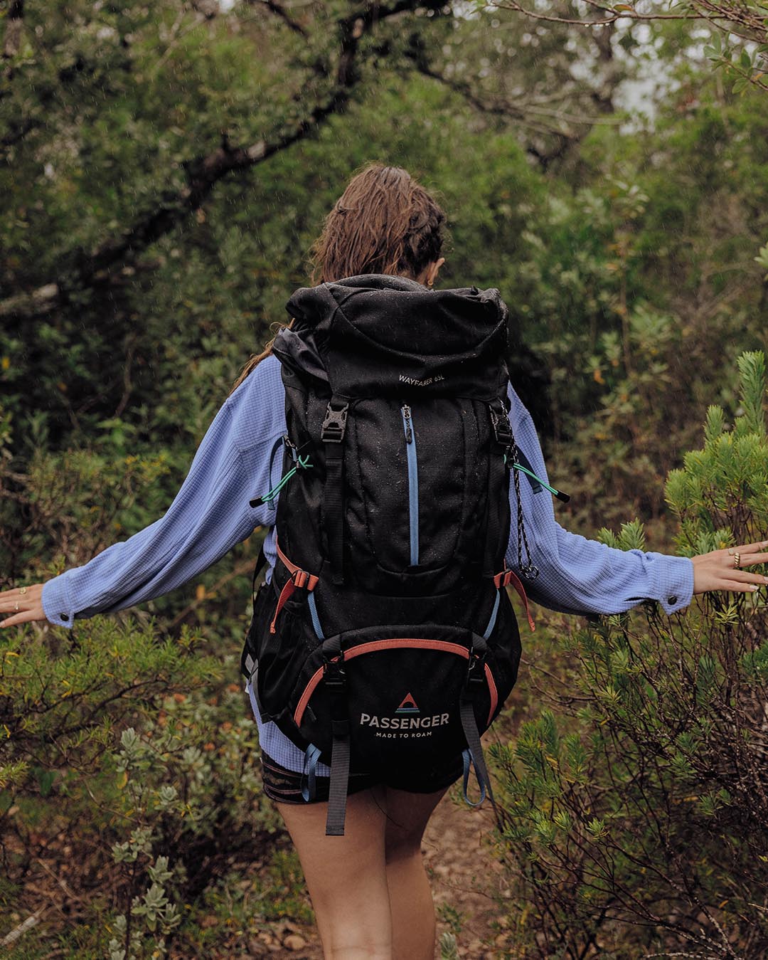 Wayfarer 65L Backpack - Black - Lifestyle - Female
