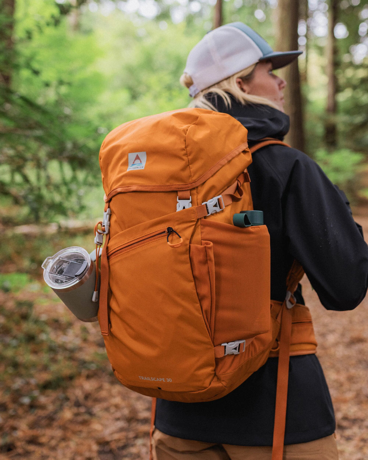 Trailscape 30L Backpack - Sunrise Orange - Lifestyle - Female