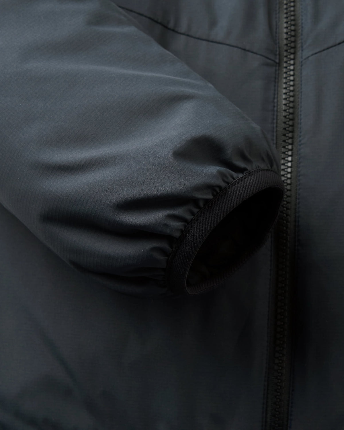 Daybreak Lightweight Thermore® Hoodless Jacket - Black - Flatlay