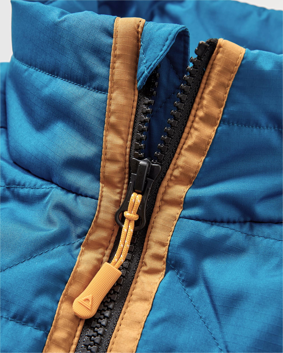 Trace Thermore® Insulated Jacket - Corsair Blue/ Jungle Green - Flatlay