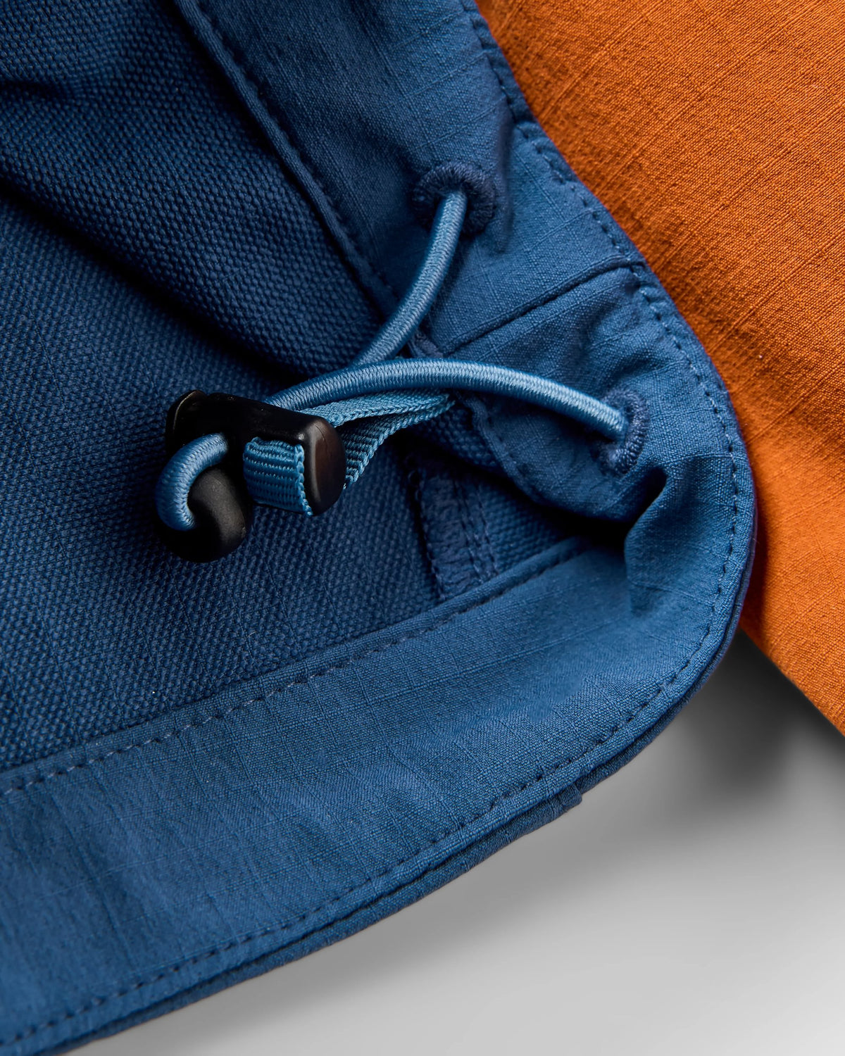 Ocean Light Softshell Anorak - Dark Denim/Sunset Orange - Flatlay
