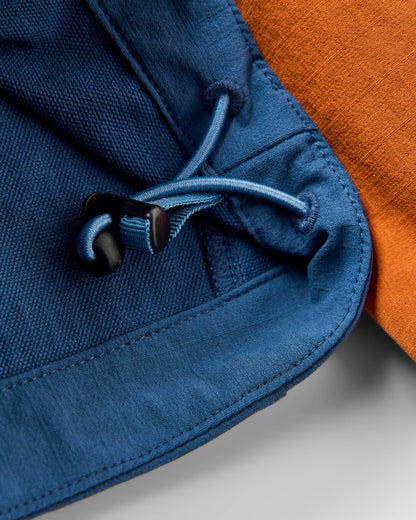 Ocean Light Softshell Anorak - Dark Denim/Sunset Orange - Flatlay