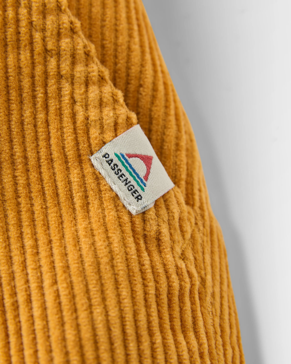 Avian Cord Short - Spruce Yellow - Flatlay